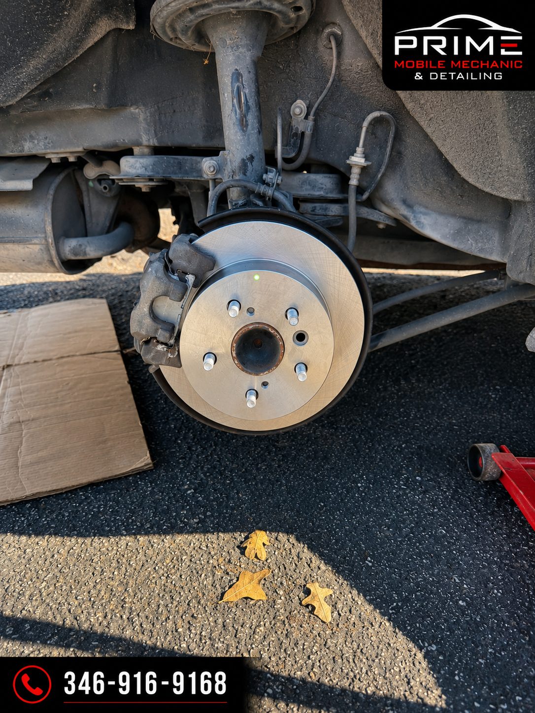 Freshly installed front brake rotor and caliper after a mobile brake service